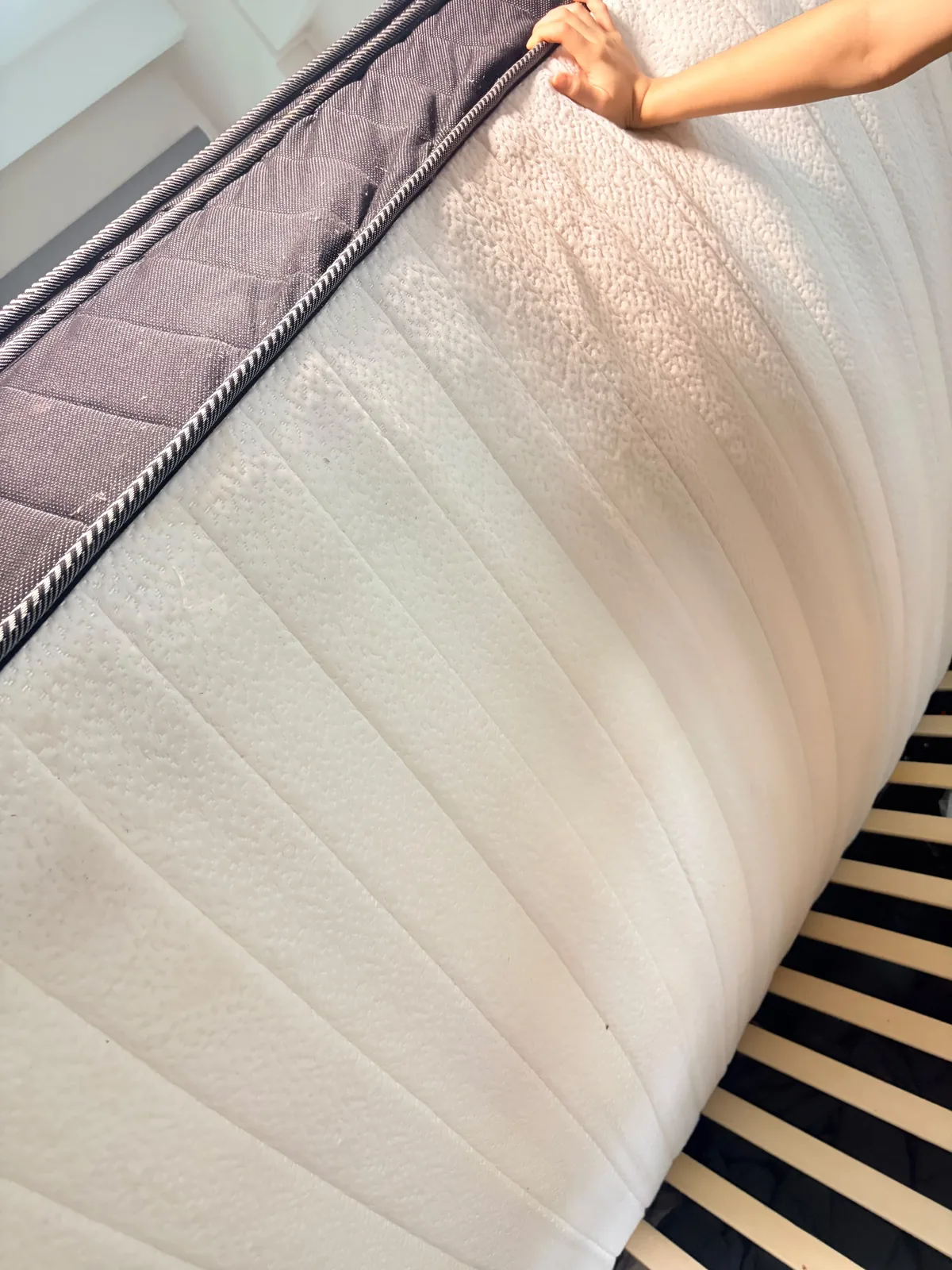 Mattress before deep cleaning โ side panel exposed for treatment
