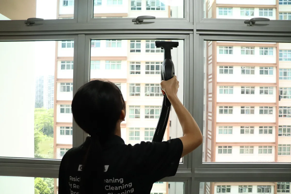 Window frame vacuuming with steam tool