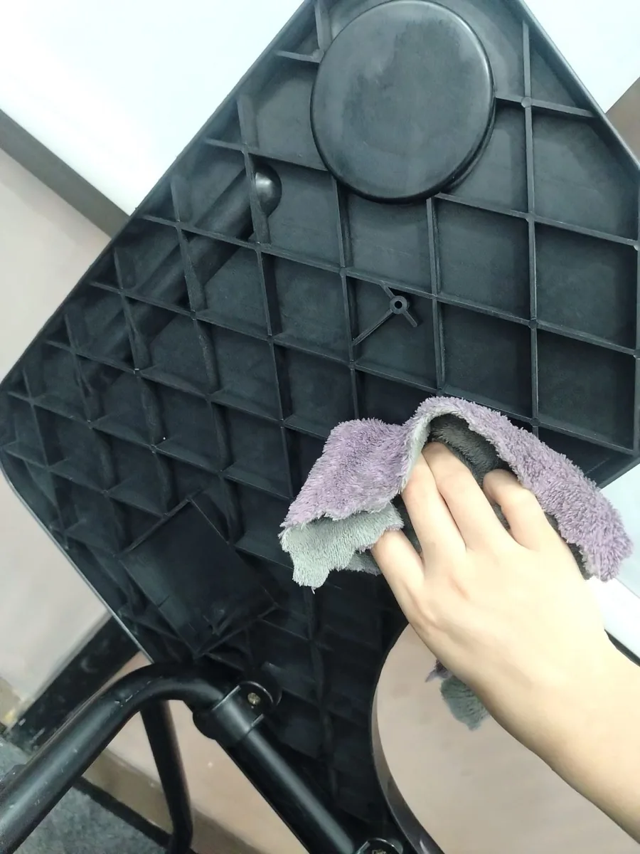 Office cleaning — chair underside wiped, no area skipped