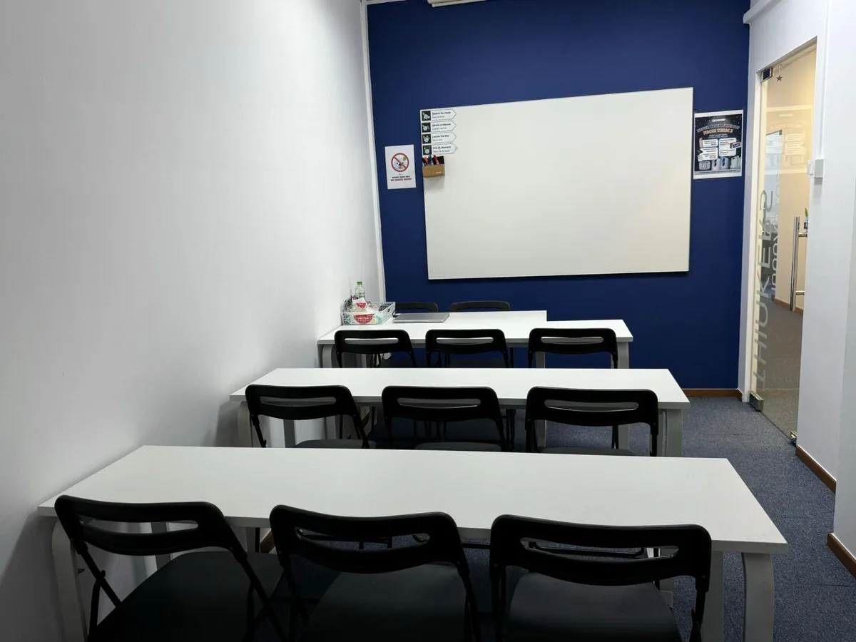Office cleaning result — small training room fully cleaned and reset