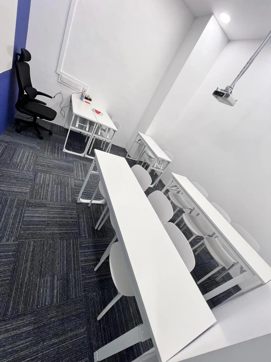 Clean training room with projector — professional office clean result