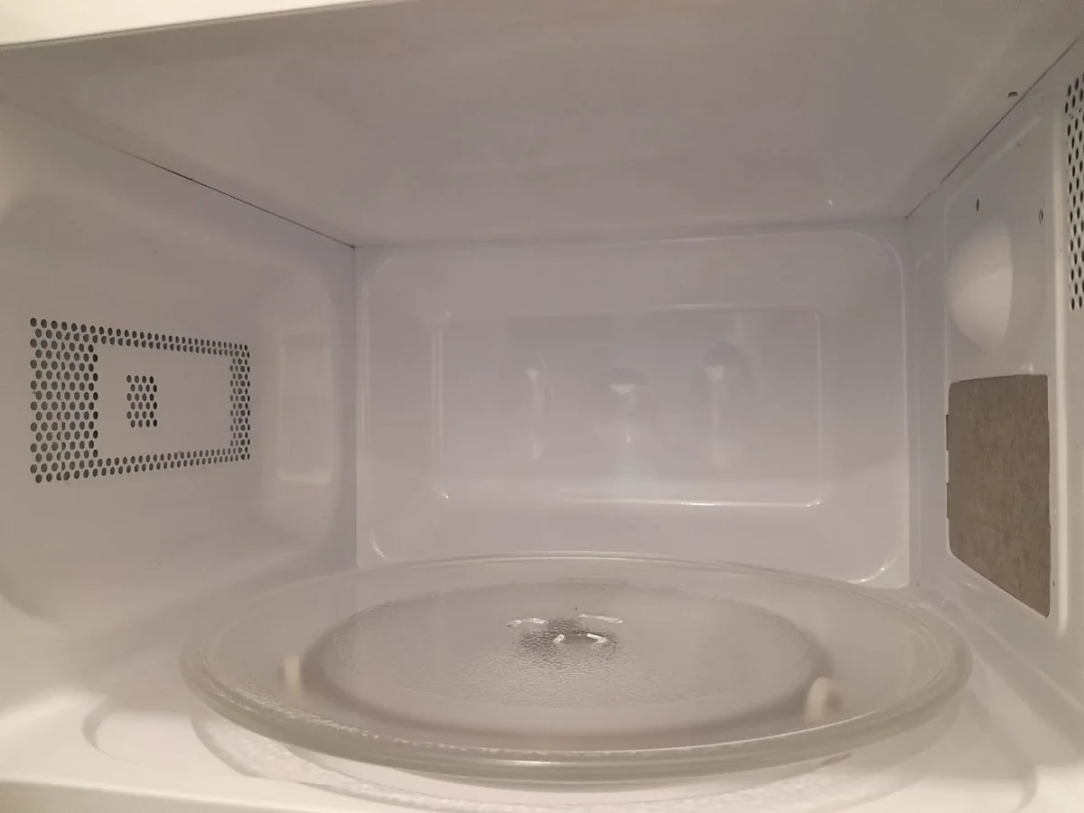 Office microwave after cleaning — interior spotless