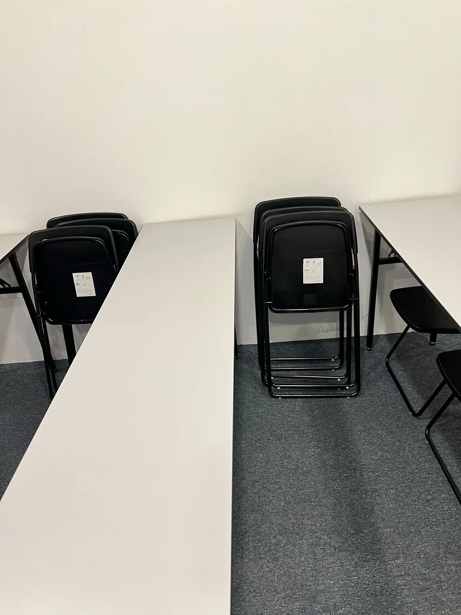Training room — chairs folded for floor cleaning access